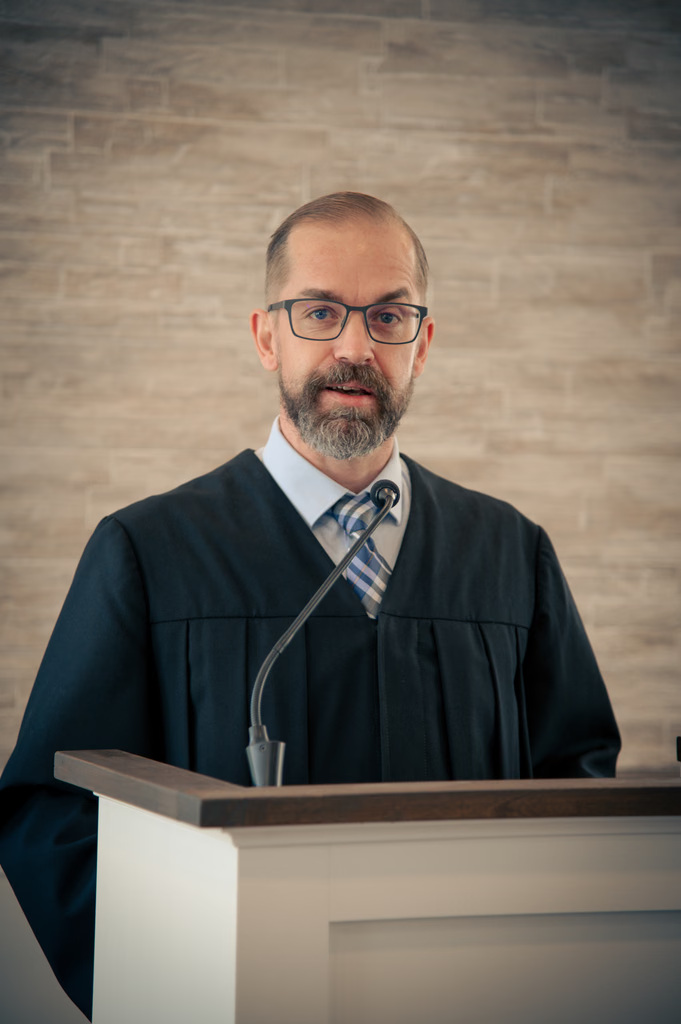 Pastor Sebastian Heck